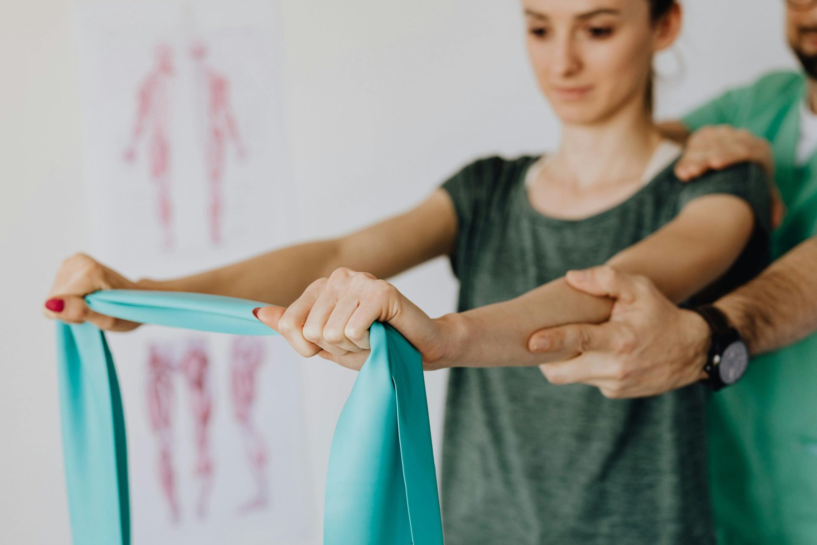 woman doing resistance band exercise with therapist supporting immune function through movement