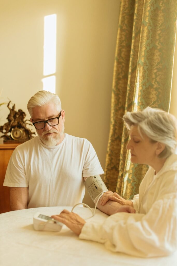 Couple over 50 checking blood pressure at home, one risk they can control after an Lp(a) test